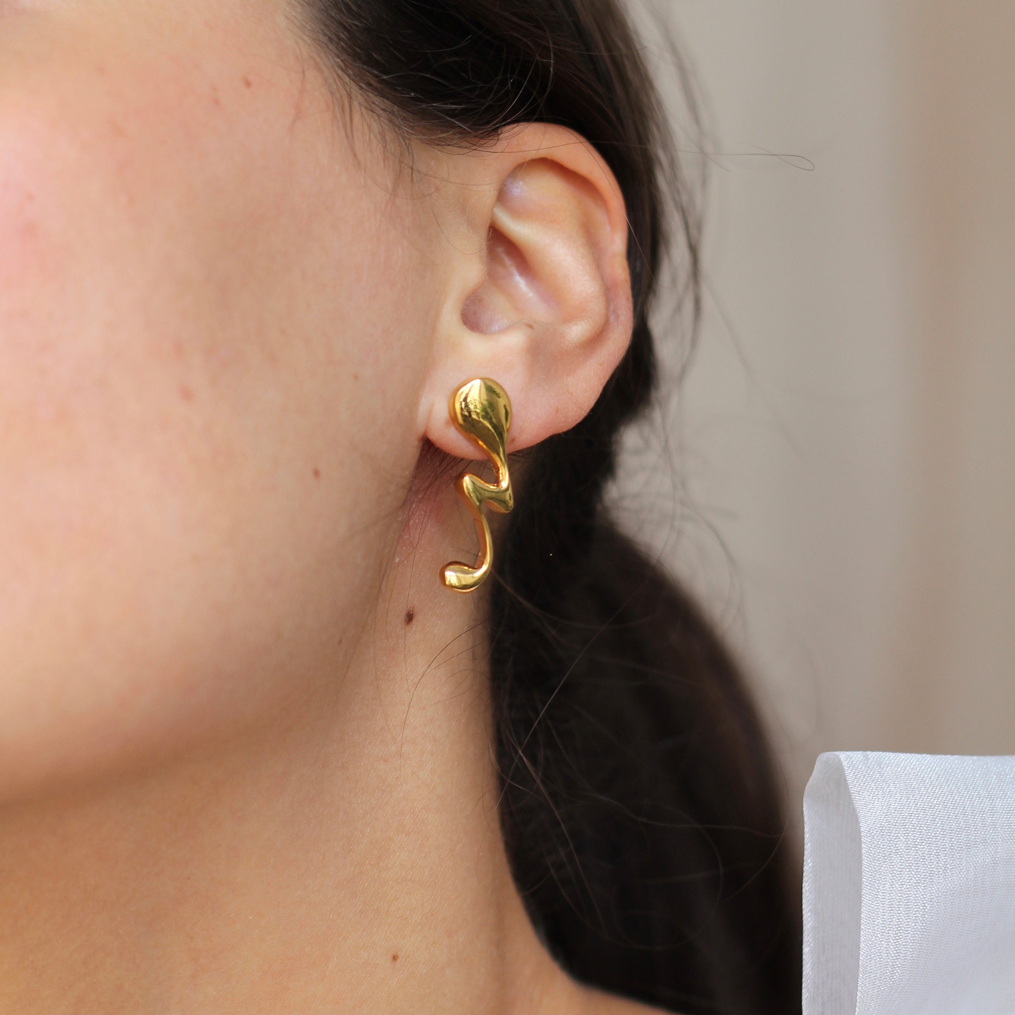 Cast Silver Uncanny Ear Studs with Gold Vermeil